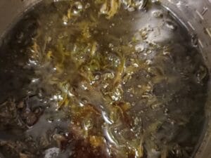 Simmer cannabis with butter and water